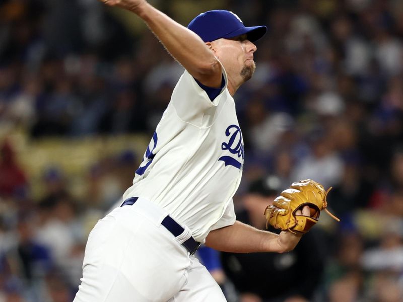 Jun 1, 2024; Los Angeles, California, USA;  Los Angeles Dodgers relief pitcher Blake Treinen (49) pitches during the eighth inning against the Colorado Rockies at Dodger Stadium. Mandatory Credit: Kiyoshi Mio-USA TODAY Sports