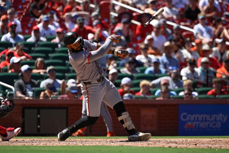 Jun 23, 2024; St. Louis, Missouri, USA; San Francisco Giants center fielder Heliot Ramos (17) loses control of his bat during an at bat against the St. Louis Cardinals in the eighth inning at Busch Stadium. Mandatory Credit: Joe Puetz-USA TODAY Sports