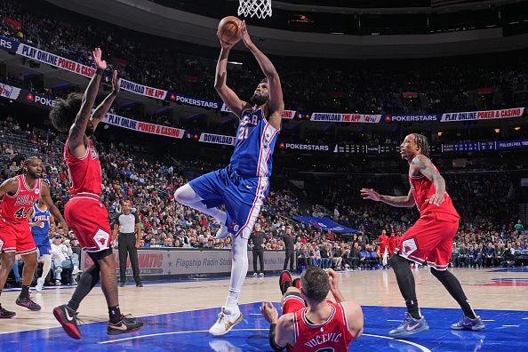 PHILADELPHIA, PA - DECEMBER 18: Joel Embiid #21 of the Philadelphia 76ers drives to the basket during the game against the Chicago Bulls on December 18, 2023 at the Wells Fargo Center in Philadelphia, Pennsylvania NOTE TO USER: User expressly acknowledges and agrees that, by downloading and/or using this Photograph, user is consenting to the terms and conditions of the Getty Images License Agreement. Mandatory Copyright Notice: Copyright 2023 NBAE (Photo by Jesse D. Garrabrant/NBAE via Getty Images)