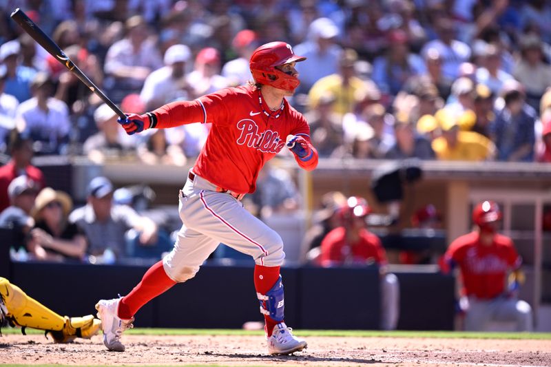 Sep 6, 2023; San Diego, California, USA; Philadelphia Phillies first baseman Bryce Harper (3) hits a two-RBI double against the San Diego Padres during the fourth inning at Petco Park. Mandatory Credit: Orlando Ramirez-USA TODAY Sports