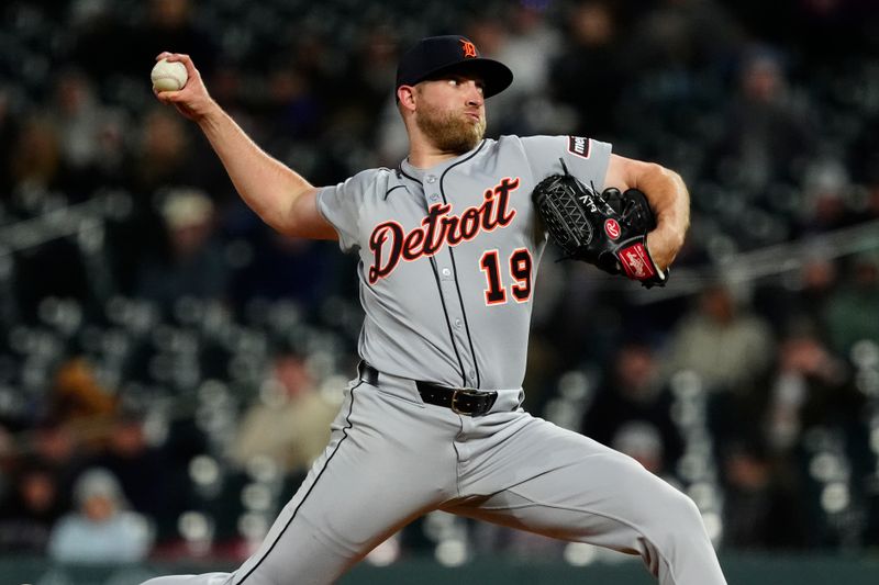 May 7, 2025; Denver, Colorado, USA; Detroit Tigers relief pitcher Will Vest (19) delivers a pitch in the tenth inning against the Colorado Rockies at Coors Field. Mandatory Credit: Ron Chenoy-Imagn Images