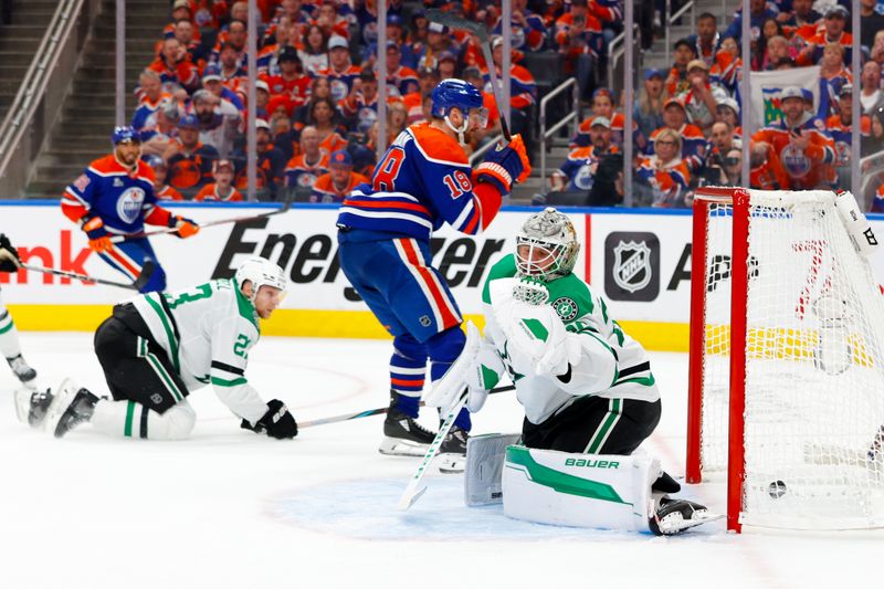 May 25, 2025; Edmonton, Alberta, CAN; Edmonton Oilers left wing Zach Hyman (18) celebrates after he scores a goal against Dallas Stars goaltender Jake Oettinger (29) during the third period in game three of the Western Conference Final of the 2025 Stanley Cup Playoffs at Rogers Place. Mandatory Credit: Perry Nelson-Imagn Images