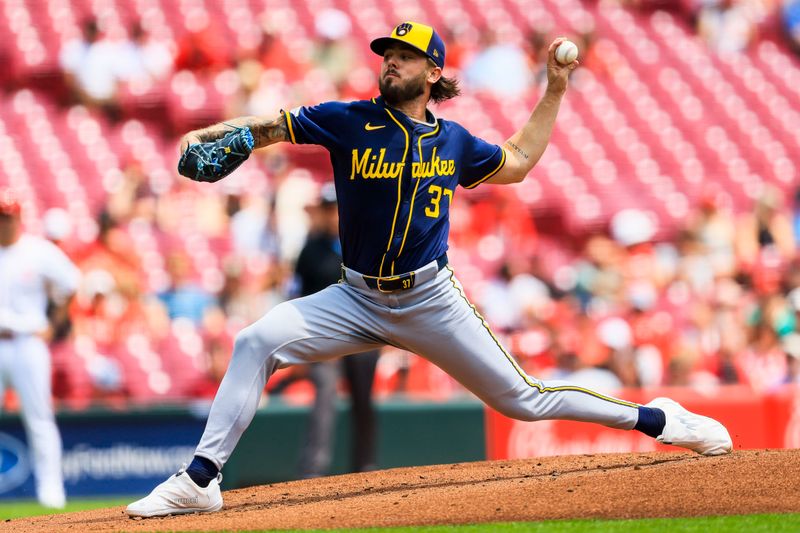 Jun 4, 2025; Cincinnati, Ohio, USA; Milwaukee Brewers starting pitcher DL Hall (37) pitches against the Cincinnati Reds in the first inning at Great American Ball Park. Mandatory Credit: Katie Stratman-Imagn Images