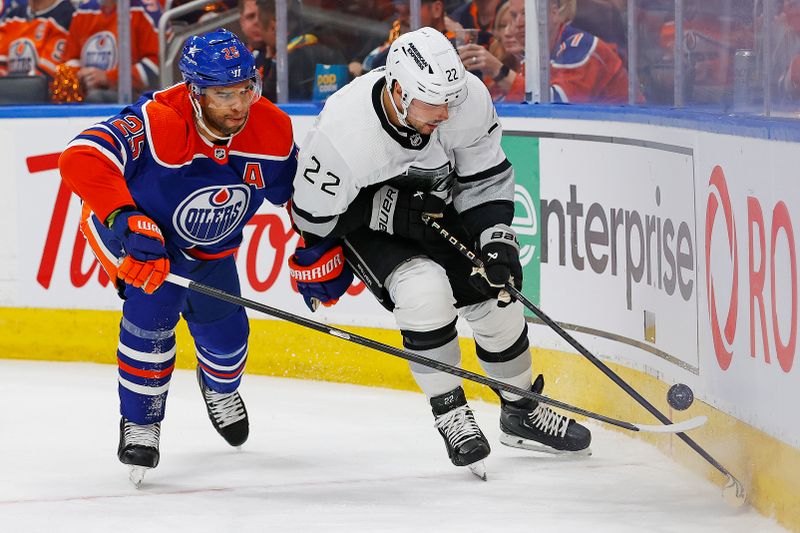 May 1, 2024; Edmonton, Alberta, CAN; Los Angeles Kings forward Kevin Fiala (22) Battles along the boards for a loose puck with Edmonton Oilers defensemen Darnell Nurse (25) during the second period in game five of the first round of the 2024 Stanley Cup Playoffs at Rogers Place. Mandatory Credit: Perry Nelson-USA TODAY Sports