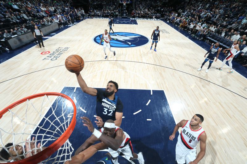 MINNEAPOLIS, MN -  MARCH 4: Karl-Anthony Towns #32 of the Minnesota Timberwolves drives to the basket during the game against the Portland Trail Blazers on March 4, 2024 at Target Center in Minneapolis, Minnesota. NOTE TO USER: User expressly acknowledges and agrees that, by downloading and or using this Photograph, user is consenting to the terms and conditions of the Getty Images License Agreement. Mandatory Copyright Notice: Copyright 2024 NBAE (Photo by David Sherman/NBAE via Getty Images)