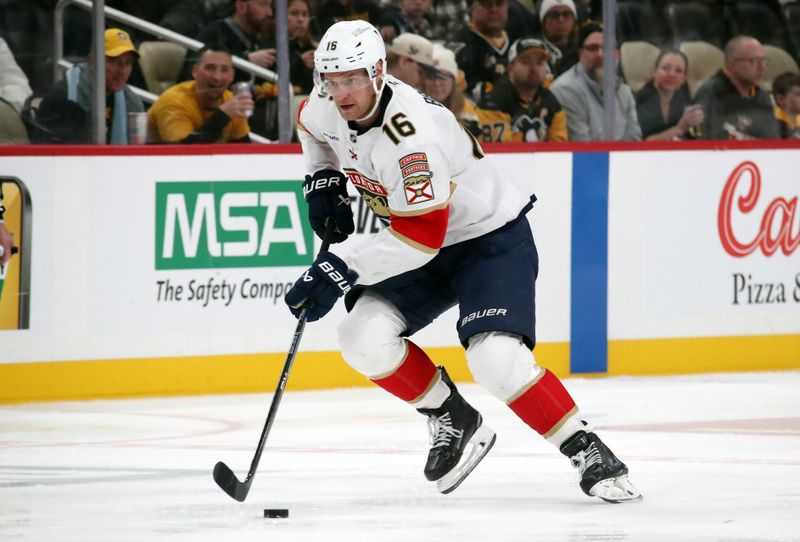 Dec 3, 2024; Pittsburgh, Pennsylvania, USA;  Florida Panthers center Aleksander Barkov (16) moves the puck up ice against the Pittsburgh Penguins during the second period at PPG Paints Arena. Mandatory Credit: Charles LeClaire-Imagn Images