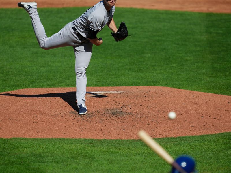 Oct 1, 2023; Kansas City, Missouri, USA; New York Yankees relief pitcher Michael King (34) pitches to Kansas City Royals shortstop Bobby Witt Jr. (7) during the third inning at Kauffman Stadium. Mandatory Credit: Jay Biggerstaff-USA TODAY Sports