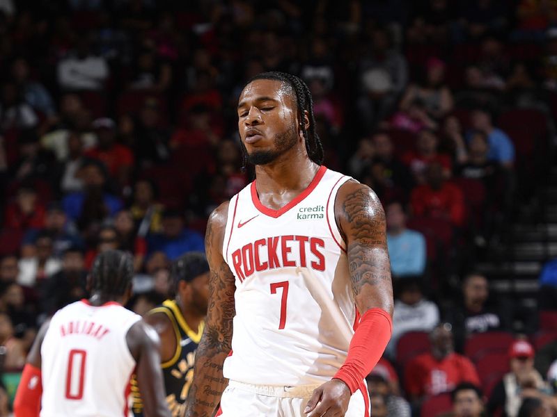 HOUSTON, TX - OCTOBER 10: Cam Whitmore #7 of the Houston Rockets looks on during the game against the Indiana Pacers on October 10, 2023 at the Toyota Center in Houston, TX. NOTE TO USER: User expressly acknowledges and agrees that, by downloading and or using this photograph, User is consenting to the terms and conditions of the Getty Images License Agreement. Mandatory Copyright Notice: Copyright 2023 NBAE (Photo by Logan Riely/NBAE via Getty Images)