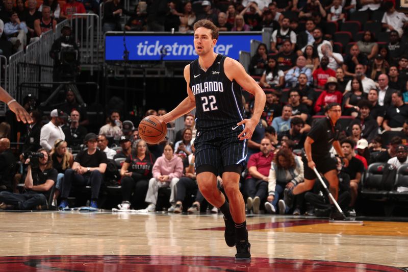 MIAMI, FL - OCTOBER 23: Franz Wagner #22 of the Orlando Magic dribbles the ball during the game against the Miami Heat on October 23, 2024 at Kaseya Center in Miami, Florida. NOTE TO USER: User expressly acknowledges and agrees that, by downloading and or using this Photograph, user is consenting to the terms and conditions of the Getty Images License Agreement. Mandatory Copyright Notice: Copyright 2024 NBAE (Photo by Issac Baldizon/NBAE via Getty Images)