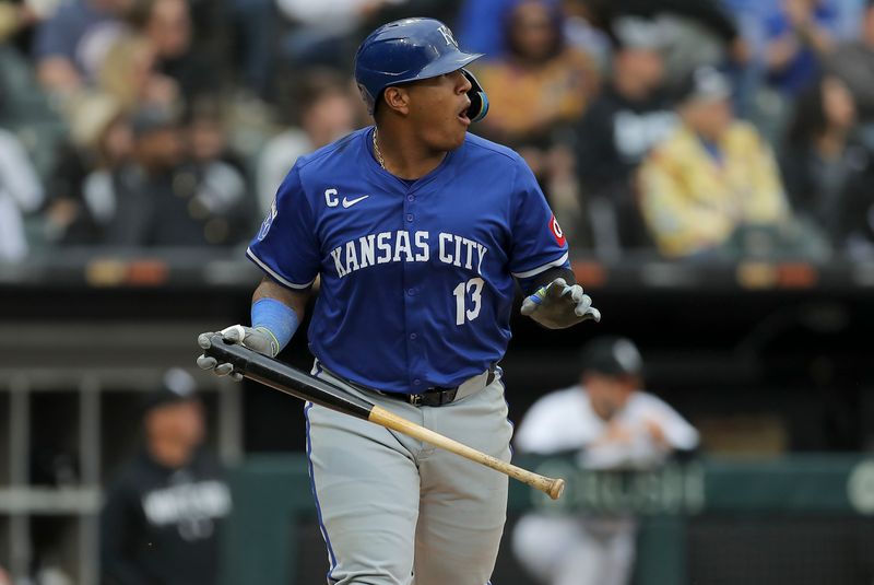 Apr 17, 2024; Chicago, Illinois, USA; Kansas City Royals catcher Salvador Perez (13) watches the ball after hitting a two-run home run in the eight inning during game one of a double header against the Chicago White Sox at Guaranteed Rate Field. Mandatory Credit: Melissa Tamez-USA TODAY Sports