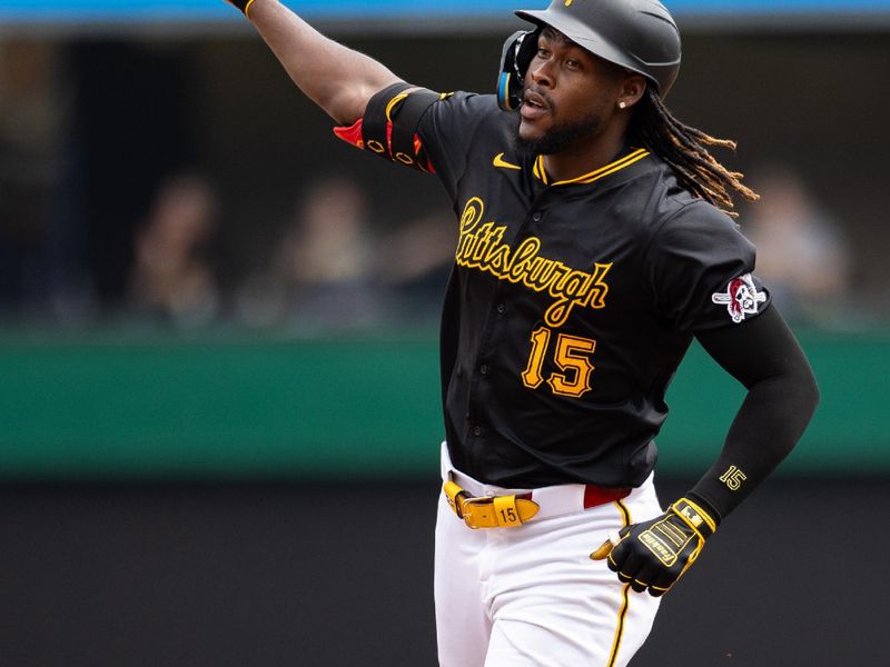 May 5, 2024; Pittsburgh, Pennsylvania, USA; Pittsburgh Pirates shortstop Oneil Cruz (15) points up after hitting a home run during the sixth inning against the Colorado Rockies at PNC Park. Mandatory Credit: Scott Galvin-USA TODAY Sports