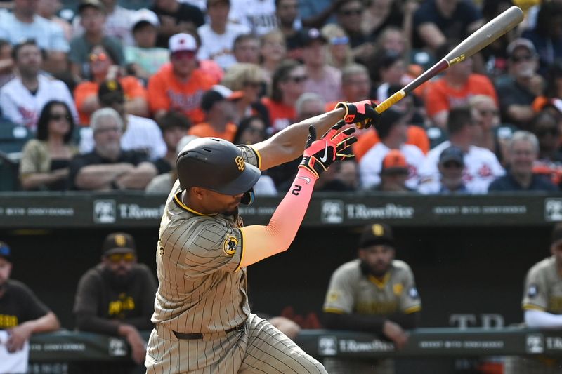 Jul 27, 2024; Baltimore, Maryland, USA;  San Diego Padres second base Xander Bogaerts (2) hits a second inning rbi single against the Baltimore Orioles at Oriole Park at Camden Yards. Mandatory Credit: Tommy Gilligan-USA TODAY Sports