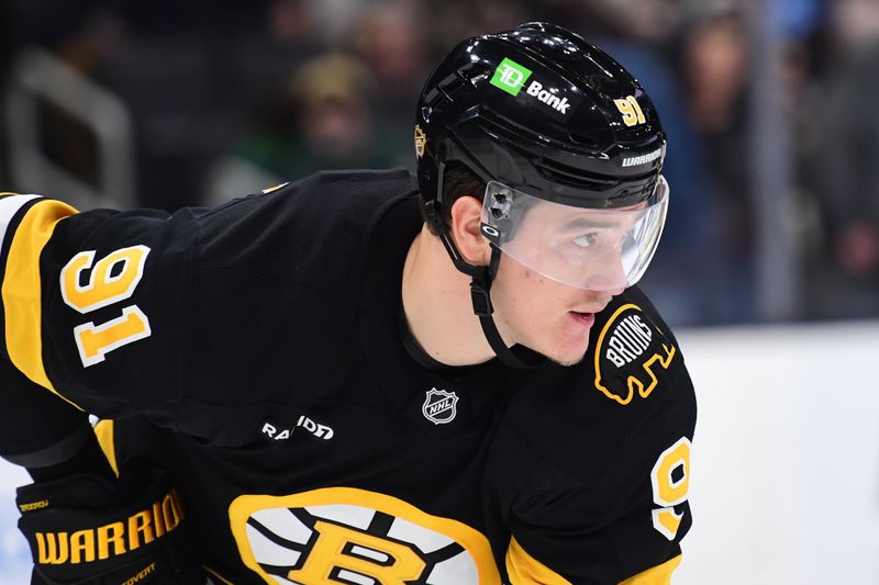 Dec 20, 2025; Boston, Massachusetts, USA; Boston Bruins defenseman Nikita Zadorov (91) gets set for a face off during the second period against the Vancouver Canucks at TD Garden. Mandatory Credit: Bob DeChiara-Imagn Images