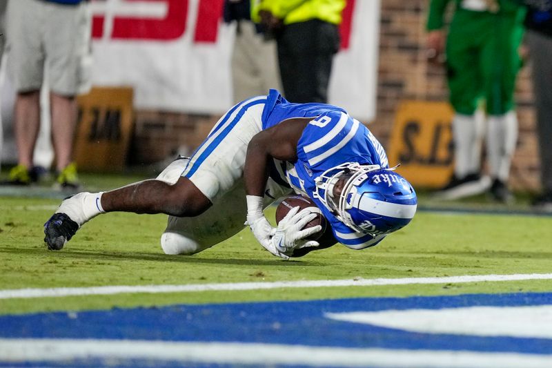 Sep 30, 2023; Durham, North Carolina, USA; Duke Blue Devils running back Jaquez Moore (9) falls just short of the goal line during the second half against the Notre Dame Fighting Irish at Wallace Wade Stadium. Mandatory Credit: Jim Dedmon-USA TODAY Sports
