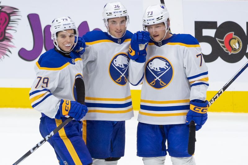 Sep 26, 2024; Ottawa, Ontario, CAN; Buffalo Sabres center Noah Ostlund (36) celebrates with team his goal scored in overtime against the Ottawa Senators at the Canadian Tire Centre. Mandatory Credit: Marc DesRosiers-Imagn Images