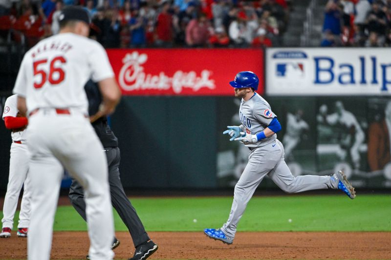 May 26, 2024; St. Louis, Missouri, USA;  Chicago Cubs left fielder Ian Happ (8) reacts as he runs the bases after hitting a solo home run off of St. Louis Cardinals relief pitcher Ryan Helsley (56) during the ninth inning at Busch Stadium. Mandatory Credit: Jeff Curry-USA TODAY Sports