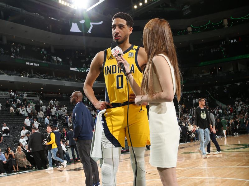 MILWAUKEE, WI - APRIL 23: Tyrese Haliburton #0 of the Indiana Pacers talks to the media after the game against the Milwaukee Bucks during Round One Game Two of the 2024 NBA Playoffs on April 23, 2024 at the Fiserv Forum Center in Milwaukee, Wisconsin. NOTE TO USER: User expressly acknowledges and agrees that, by downloading and or using this Photograph, user is consenting to the terms and conditions of the Getty Images License Agreement. Mandatory Copyright Notice: Copyright 2024 NBAE (Photo by Gary Dineen/NBAE via Getty Images).