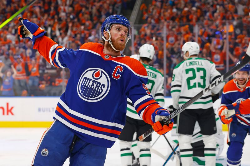 Jun 2, 2024; Edmonton, Alberta, CAN; Edmonton Oilers forward Connor McDavid (97) celebrates after scoring a goal against the Dallas Stars during the first period in game six of the Western Conference Final of the 2024 Stanley Cup Playoffs at Rogers Place. Mandatory Credit: Perry Nelson-USA TODAY Sports