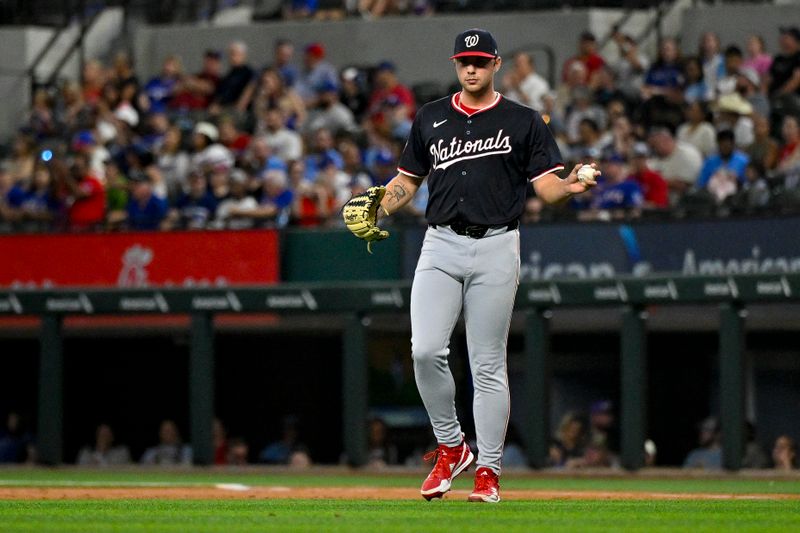 May 2, 2024; Arlington, Texas, USA; Washington Nationals starting pitcher Mitchell Parker (70) comes off the field after he pitches against the Texas Rangers during the second inning at Globe Life Field. Mandatory Credit: Jerome Miron-USA TODAY Sports