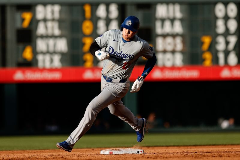 Jun 17, 2024; Denver, Colorado, USA; Los Angeles Dodgers designated hitter Shohei Ohtani (17) rounds second on an RBI in the second inning against the Colorado Rockies at Coors Field. Mandatory Credit: Isaiah J. Downing-USA TODAY Sports