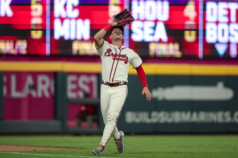 May 30, 2024; Atlanta, Georgia, USA; Atlanta Braves left fielder Jarred Kelenic (24) catches a fly ball against the Washington Nationals in the ninth inning at Truist Park. Mandatory Credit: Brett Davis-USA TODAY Sports
