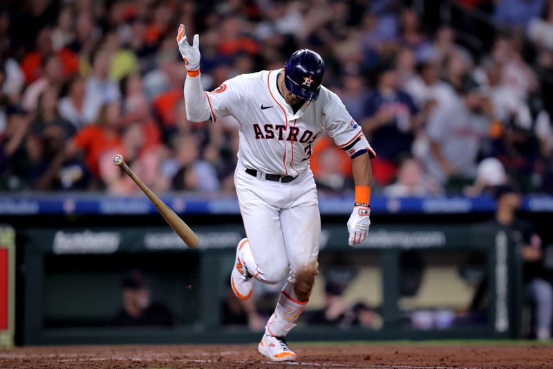 Apr 30, 2024; Houston, Texas, USA; Houston Astros shortstop Jeremy Pena (3) flips his bat after hitting a single against the Cleveland Guardians during the fifth inning at Minute Maid Park. Mandatory Credit: Erik Williams-USA TODAY Sports