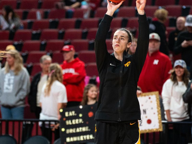 Feb 11, 2024; Lincoln, Nebraska, USA; Iowa Hawkeyes guard Caitlin Clark (22) warms up before the game against the Nebraska Cornhuskers at Pinnacle Bank Arena. Mandatory Credit: Dylan Widger-USA TODAY Sports