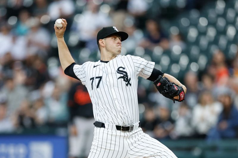 May 24, 2024; Chicago, Illinois, USA; Chicago White Sox starting pitcher Chris Flexen (77) delivers a pitch against the Baltimore Orioles during the first inning at Guaranteed Rate Field. Mandatory Credit: Kamil Krzaczynski-USA TODAY Sports