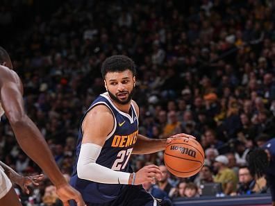 DENVER, CO - DECEMBER 28: Jamal Murray #27 of the Denver Nuggets goes to the basket during the game on December 28, 2023 at the Ball Arena in Denver, Colorado. NOTE TO USER: User expressly acknowledges and agrees that, by downloading and/or using this Photograph, user is consenting to the terms and conditions of the Getty Images License Agreement. Mandatory Copyright Notice: Copyright 2023 NBAE (Photo by Bart Young/NBAE via Getty Images)