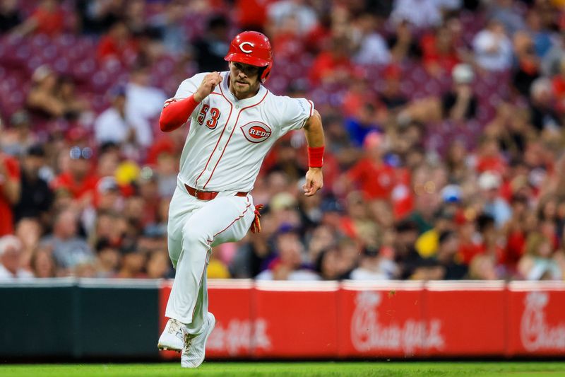 Jun 24, 2024; Cincinnati, Ohio, USA; Cincinnati Reds outfielder Levi Jordan (53) scores on a RBI double hit by catcher Luke Maile (not pictured) in the sixth inning against the Pittsburgh Pirates at Great American Ball Park. Mandatory Credit: Katie Stratman-USA TODAY Sports