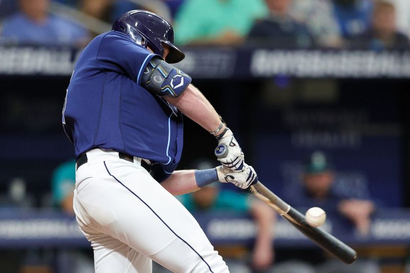 Sep 9, 2023; St. Petersburg, Florida, USA;  Tampa Bay Rays designated hitter Luke Raley (55) breaks his bat on a line out against the Seattle Mariners in the fourth inning at Tropicana Field. Mandatory Credit: Nathan Ray Seebeck-USA TODAY Sports