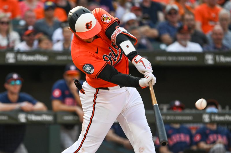 Aug 24, 2024; Baltimore, Maryland, USA; Baltimore Orioles catcher Adley Rutschman (35) doubles during the third inning against the Houston Astros  at Oriole Park at Camden Yards. Mandatory Credit: Tommy Gilligan-USA TODAY Sports