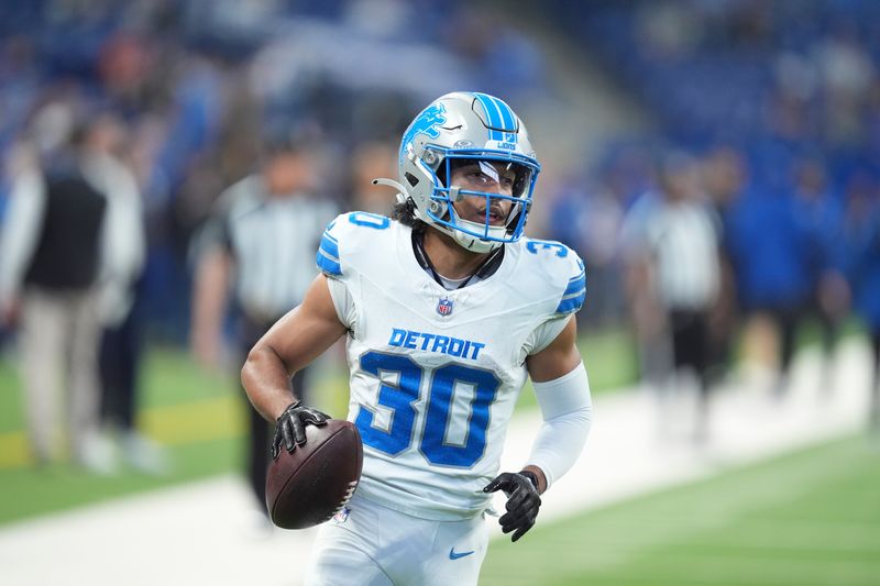 Detroit Lions cornerback Khalil Dorsey runs a drill during pregame of an NFL football game against the Indianapolis Colts, Sunday, Nov. 24, 2024, in Indianapolis. (AP Photo/Michael Conroy)