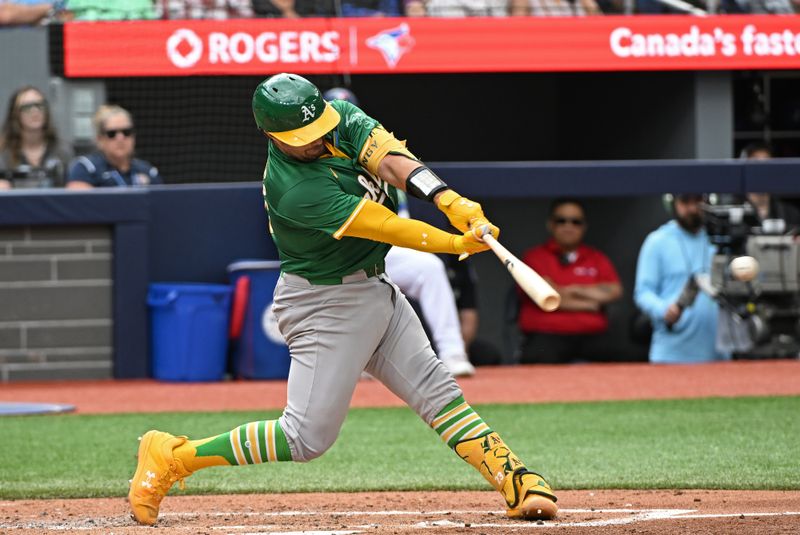 Aug 10, 2024; Toronto, Ontario, CAN; Oakland Athletics catcher Shea Langeliers (23) hits a single in the fourth inning against the Toronto Blue Jays at Rogers Centre. Mandatory Credit: Gerry Angus-USA TODAY Sports