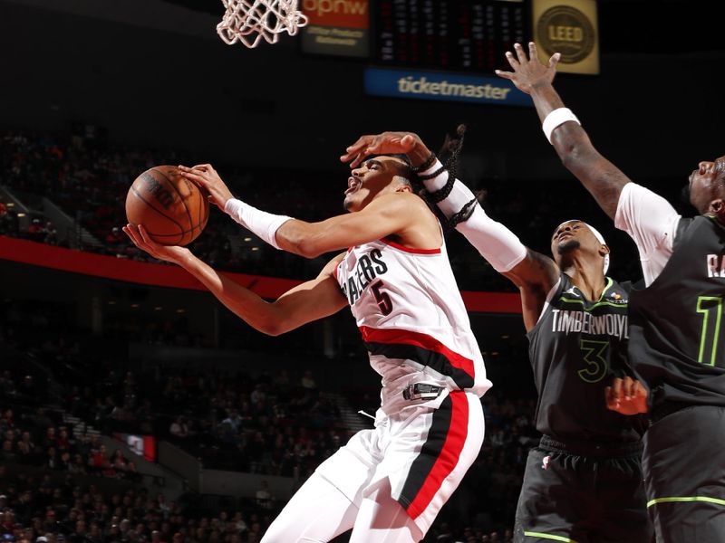 PORTLAND, OR - NOVEMBER 13: Dalano Banton #5 of the Portland Trail Blazers drives to the basket during the game against the Minnesota Timberwolves on November 13, 2024 at the Moda Center Arena in Portland, Oregon. NOTE TO USER: User expressly acknowledges and agrees that, by downloading and or using this photograph, user is consenting to the terms and conditions of the Getty Images License Agreement. Mandatory Copyright Notice: Copyright 2024 NBAE (Photo by Cameron Browne/NBAE via Getty Images)