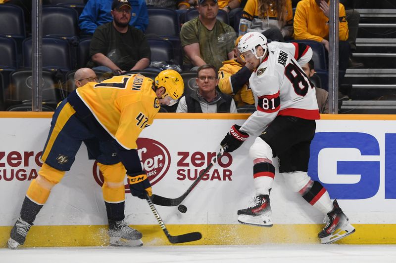 Feb 27, 2024; Nashville, Tennessee, USA; Nashville Predators right wing Michael McCarron (47) and Ottawa Senators left wing Dominik Kubalik (81) battle for a puck during the third period at Bridgestone Arena. Mandatory Credit: Christopher Hanewinckel-USA TODAY Sports