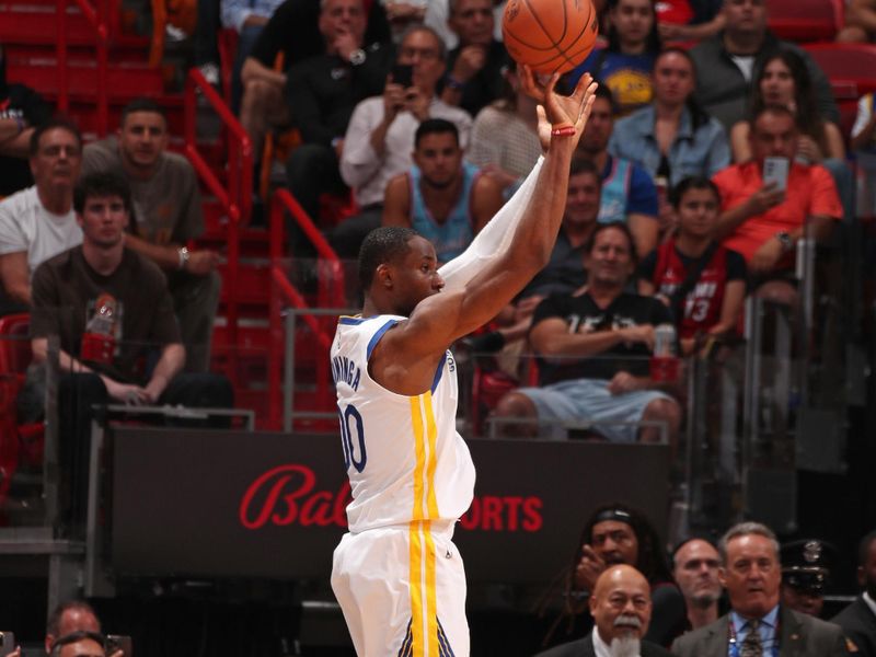 MIAMI, FL - MARCH 26:  Jonathan Kuminga #00 of the Golden State Warriors shoots the ball during the game against the Miami Heat on March 26, 2024 at Kaseya Center in Miami, Florida. NOTE TO USER: User expressly acknowledges and agrees that, by downloading and or using this Photograph, user is consenting to the terms and conditions of the Getty Images License Agreement. Mandatory Copyright Notice: Copyright 2024 NBAE (Photo by Issac Baldizon/NBAE via Getty Images)