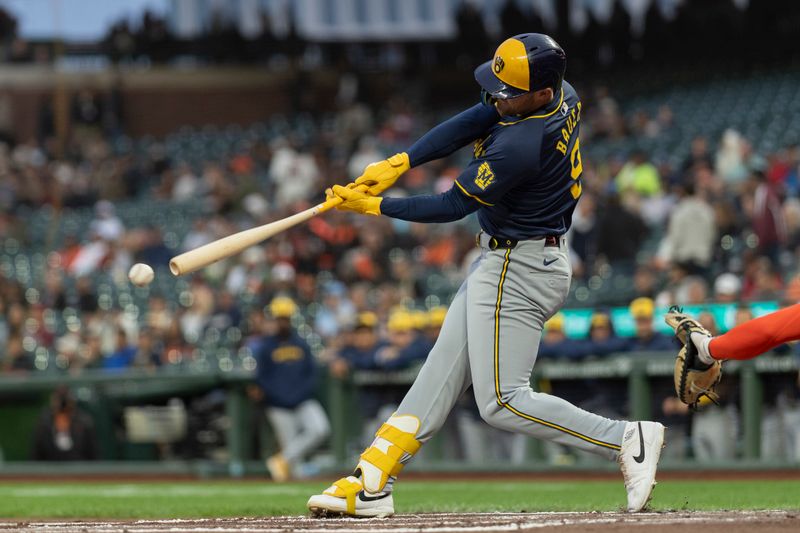 Sep 10, 2024; San Francisco, California, USA;  Milwaukee Brewers first base Jake Bauers (9) hits a single during the first inning against the San Francisco Giants at Oracle Park. Mandatory Credit: Stan Szeto-Imagn Images