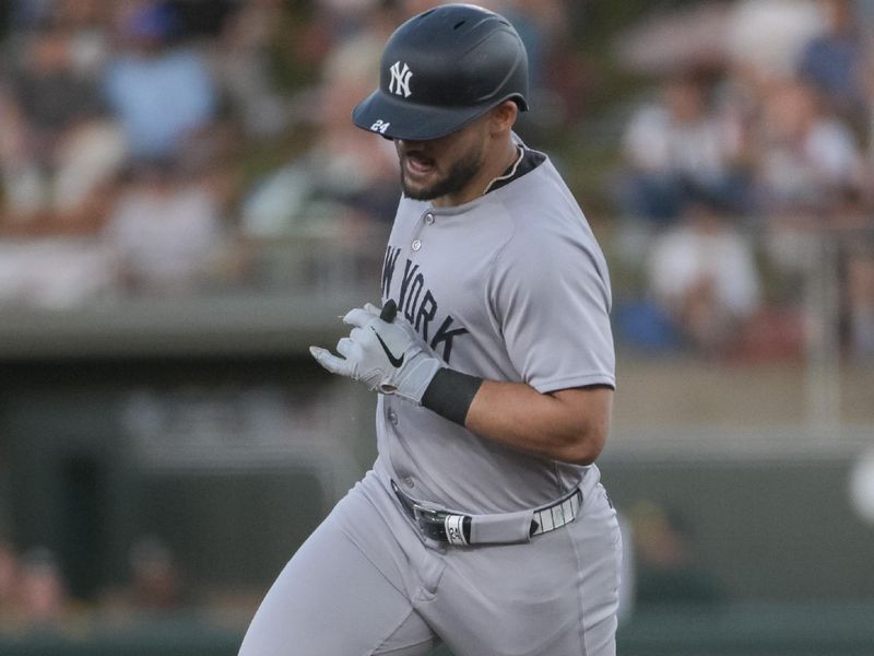 May 9, 2025; West Sacramento, California, USA; New York Yankees outfielder Jasson Dominguez (24) rounds the bases after hitting a home run against the Athletics during the third inning at Sutter Health Park. Mandatory Credit: Ed Szczepanski-Imagn Images