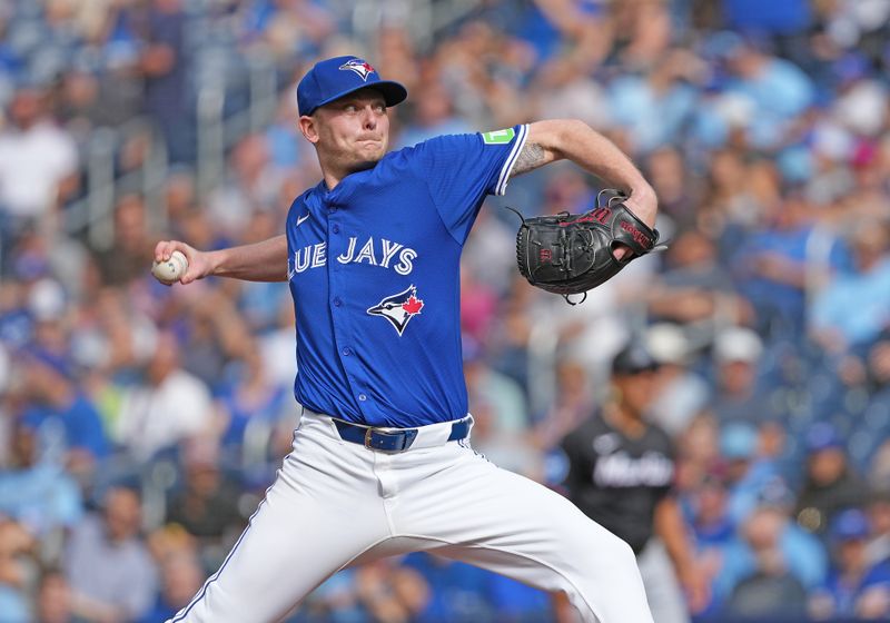 Sep 29, 2024; Toronto, Ontario, CAN; Toronto Blue Jays starting pitcher Ryan Burr (43) throws a pitch against the Miami Marlins during the first inning at Rogers Centre. Mandatory Credit: Nick Turchiaro-Imagn Images