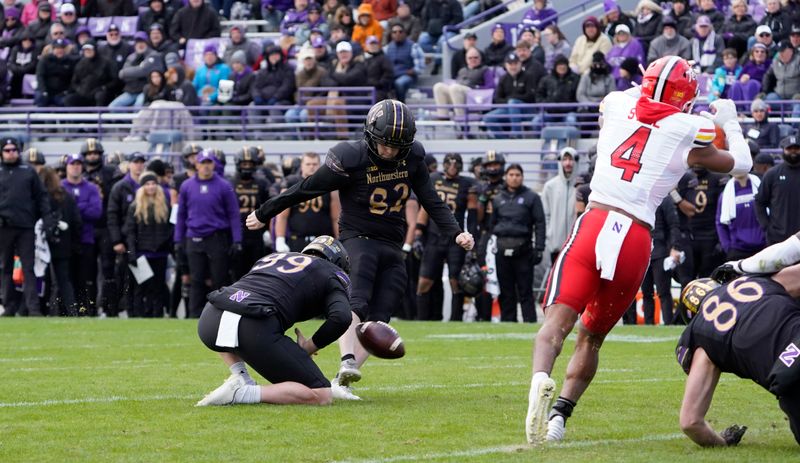 Oct 28, 2023; Evanston, Illinois, USA; Northwestern Wildcats place kicker Jack Olsen (82) kicks a field goal against the Maryland Terrapins during the second half at Ryan Field. Mandatory Credit: David Banks-USA TODAY Sports