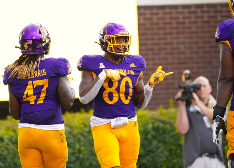 Sep 3, 2022; Greenville, North Carolina, USA;  East Carolina Pirates tight end Shane Calhoun (80) celebrates his touchdown catch against the North Carolina State Wolfpack during the second half at Dowdy-Ficklen Stadium. Mandatory Credit: James Guillory-USA TODAY Sports