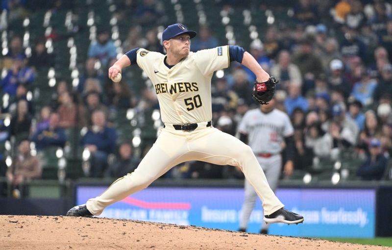 Apr 3, 2024; Milwaukee, Wisconsin, USA; Milwaukee Brewers relief pitcher J.B. Bukauskas delivers a pitch against the Minnesota Twins in the fifth inning at American Family Field. Mandatory Credit: Michael McLoone-USA TODAY Sports