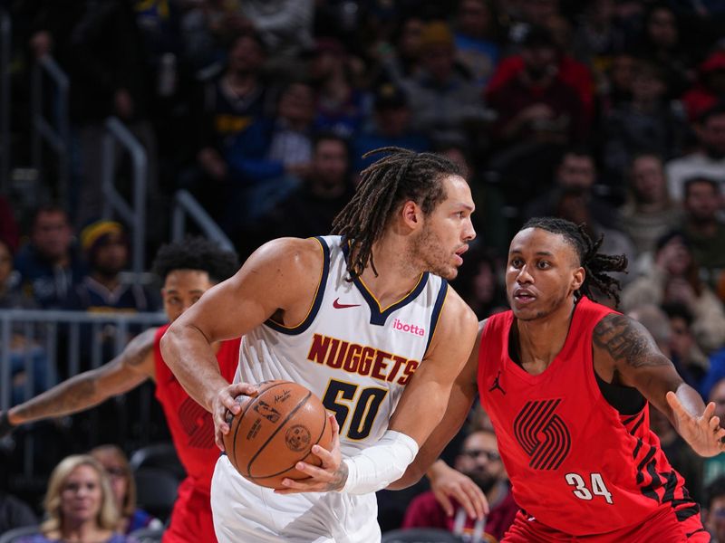 DENVER, CO - FEBRUARY 4: Aaron Gordon #50 of the Denver Nuggets handles the ball during the game  on February 4, 2024 at the Ball Arena in Denver, Colorado. NOTE TO USER: User expressly acknowledges and agrees that, by downloading and/or using this Photograph, user is consenting to the terms and conditions of the Getty Images License Agreement. Mandatory Copyright Notice: Copyright 2024 NBAE (Photo by Garrett Ellwood/NBAE via Getty Images)