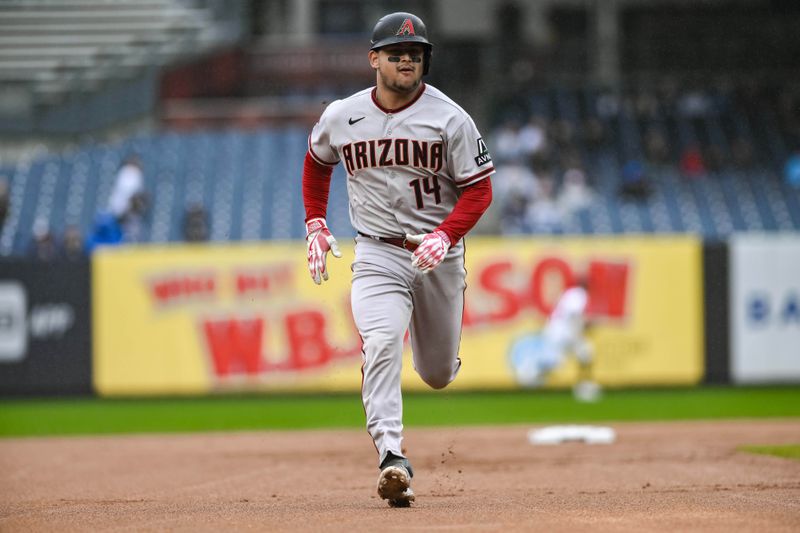 Sep 25, 2023; Bronx, New York, USA; Arizona Diamondbacks catcher Gabriel Moreno (14) runs the bases to score on a two run triple by Arizona Diamondbacks center fielder Alek Thomas (not pictured) against the New York Yankees during the first inning at Yankee Stadium. Mandatory Credit: John Jones-USA TODAY Sports