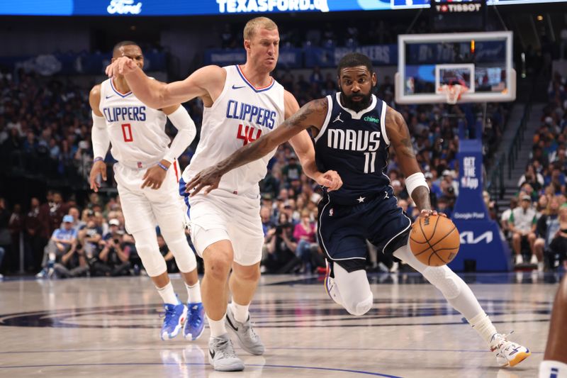 DALLAS, TX - APRIL 28: Kyrie Irving #11 of the Dallas Mavericks drives to the basket during the game against the LA Clippers during Round 1 Game 4 of the 2024 NBA Playoffs on April 28, 2024 at the American Airlines Center in Dallas, Texas. NOTE TO USER: User expressly acknowledges and agrees that, by downloading and or using this photograph, User is consenting to the terms and conditions of the Getty Images License Agreement. Mandatory Copyright Notice: Copyright 2024 NBAE (Photo by Tim Heitman/NBAE via Getty Images)