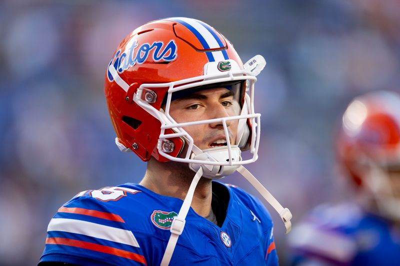 Sep 9, 2023; Gainesville, Florida, USA; Florida Gators quarterback Graham Mertz (15) participates in a drill before the game against the McNeese State Cowboys at Ben Hill Griffin Stadium. Mandatory Credit: Matt Pendleton-USA TODAY Sports