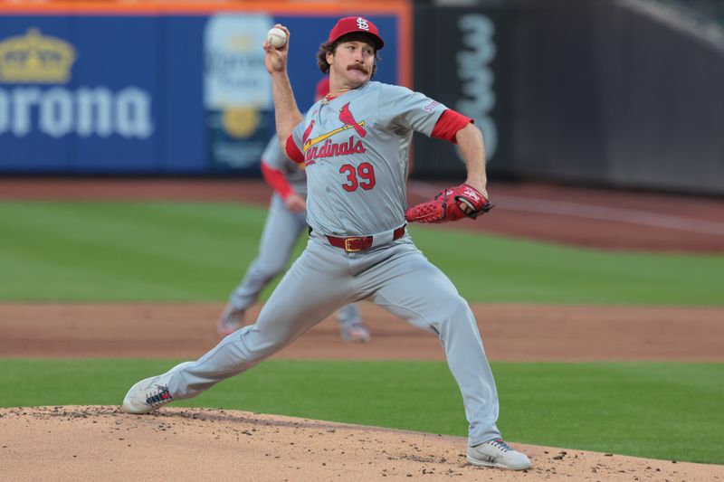 Apr 26, 2024; New York City, New York, USA; St. Louis Cardinals starting pitcher Miles Mikolas (39) delivers a pitch against the New York Mets during the first inning at Citi Field. Mandatory Credit: Vincent Carchietta-USA TODAY Sports