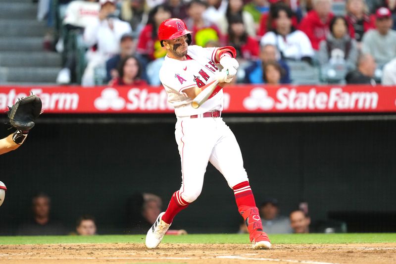 May 24, 2023; Anaheim, California, USA; Los Angeles Angels shortstop Zach Neto (9) hits a three-run home run in the second inning against the Boston Red Sox at Angel Stadium. Mandatory Credit: Kirby Lee-USA TODAY Sports