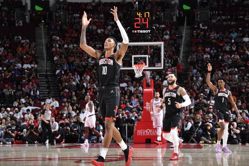 HOUSTON, TX - NOVEMBER 13:  Jabari Smith Jr. #10 of the Houston Rockets celebrates during the game against the LA Clippers on November 13, 2024 at the Toyota Center in Houston, Texas. NOTE TO USER: User expressly acknowledges and agrees that, by downloading and or using this photograph, User is consenting to the terms and conditions of the Getty Images License Agreement. Mandatory Copyright Notice: Copyright 2024 NBAE (Photo by Logan Riely/NBAE via Getty Images)